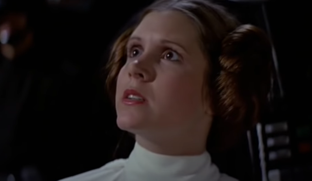 princess leia in a white sweater looking at the side