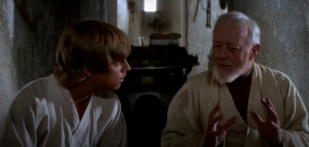 Obi-Wan and an old man sitting together and looking at each other